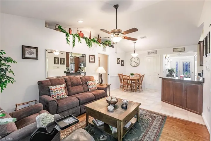 Tiled living room with ceiling fan