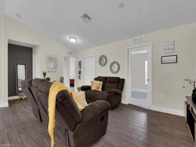 Great Room w/ Glass Door To The Den