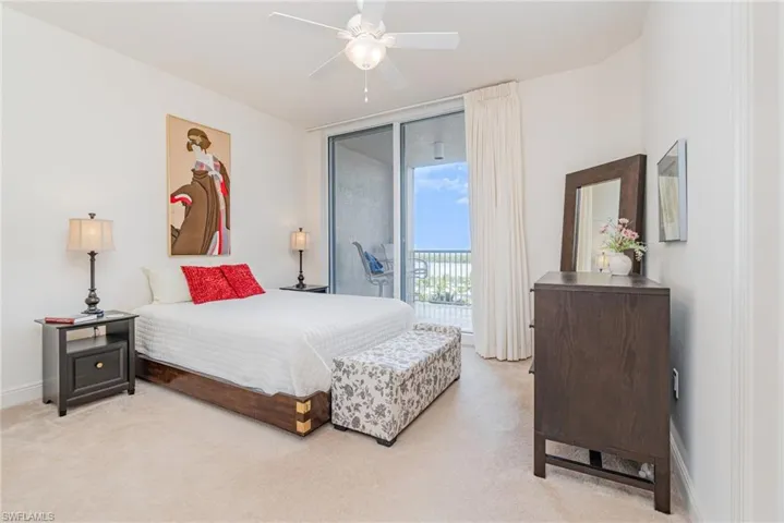 GUEST BEDROOM 1 WITH DIRECT LANAI ACCESS.