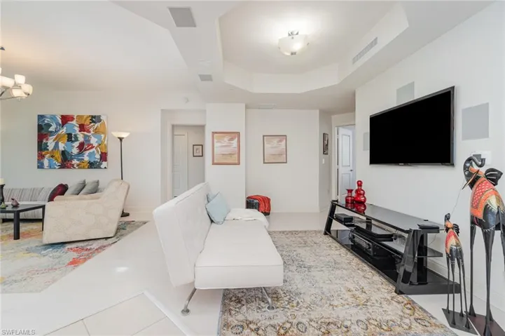 MAIN LIVING AREA.  ENTRANCE TO OWNER'S SUITE IS SHOWN MIDDLE REAR.  GUEST BEDROOM 1 ENTRANCE SHOWN AT MIDDLE LEFT.