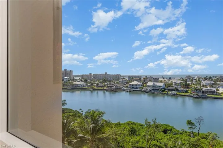 FROM THE DINING WINDOW (IN THE DISTANCE) YOU CAN SEE LOVERS KEY AND GULF BEACHES