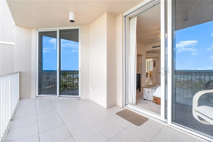 OPEN AIR TERRACE SHOWING ENTRANCE TO BOTH GUEST BEDROOMS