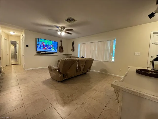 Main Living Room with ceiling fan, and tile floors