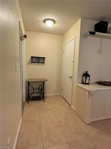 Front Entrance With Hall Closet.