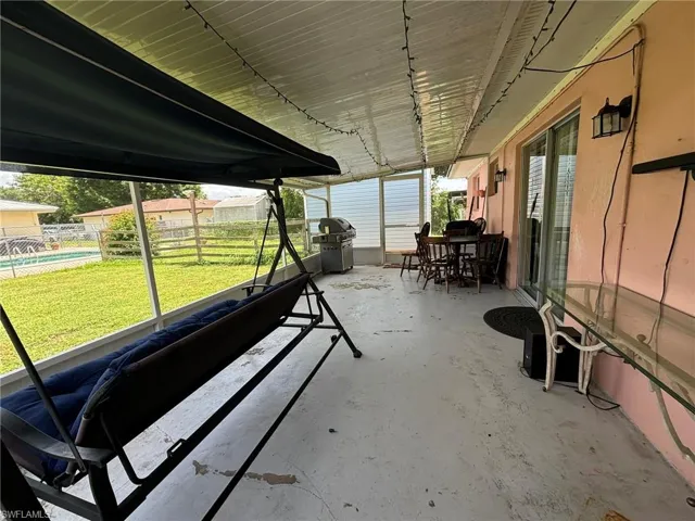 Screened Lanai featuring a wealth of natural light