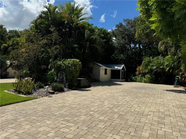 View of front of house with an outdoor structure