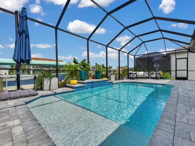 Custom Built Pool w/ Waterfall & Sun Shelf