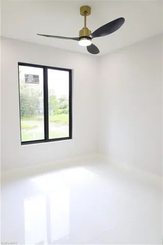 Empty room with a ceiling fan