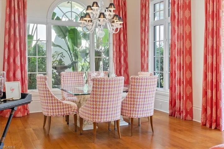 Dining room with a chandelier and wood finished floors