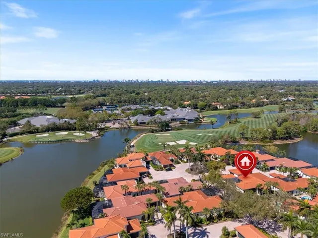Aerial view featuring a water view, a residential view, and golf course view