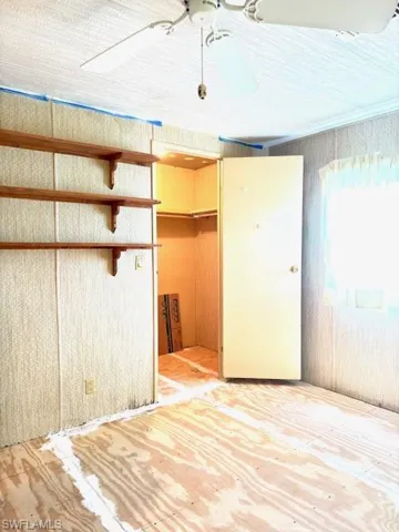 Smaller walk in closet in guest bedroom