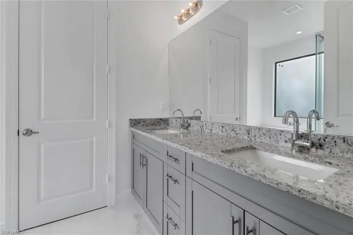 Featuring double vanity.