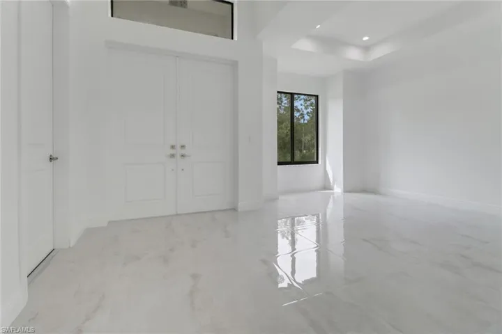 Entryway featuring a beautiful double door.