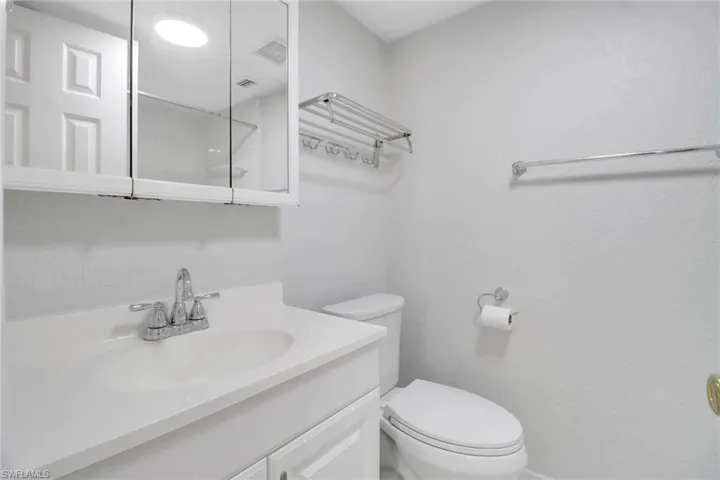 Bathroom featuring toilet and vanity