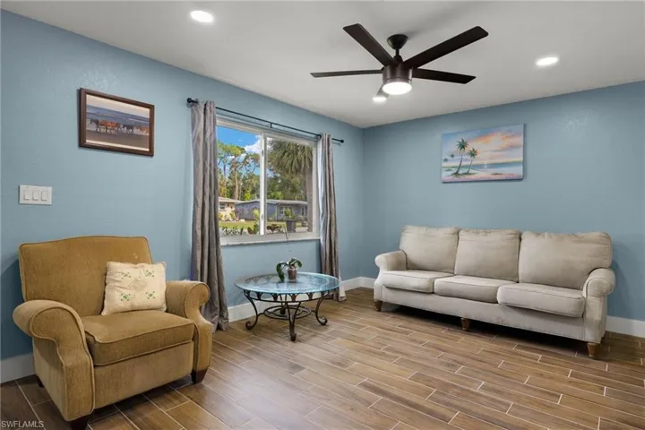 Living area featuring ceiling fan