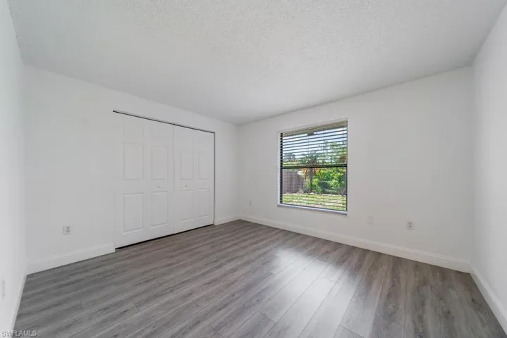 Back Guest bedroom 2, includes blinds, updated LVT flooring