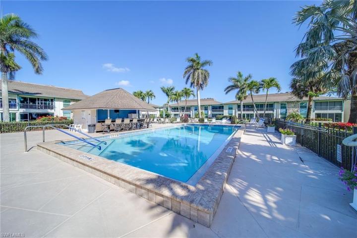Large pool and tiki hut, a gathering spot for the friendly residents.