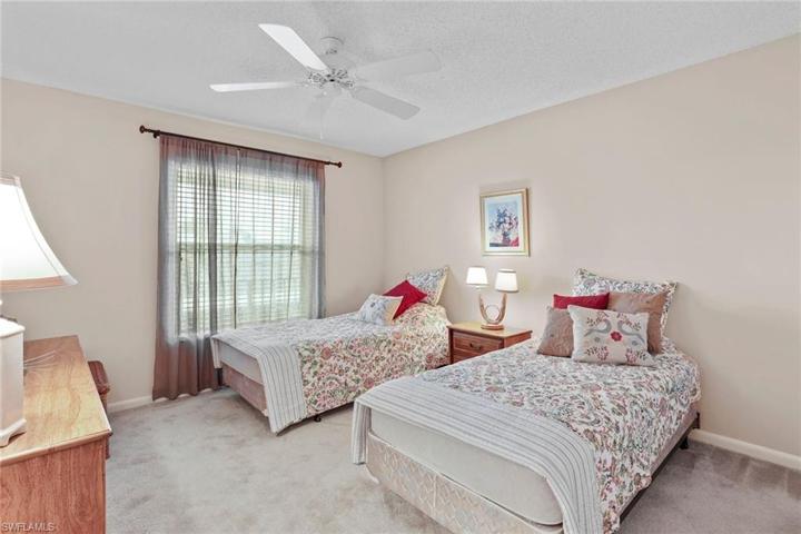 Guest bedroom, front impact window.