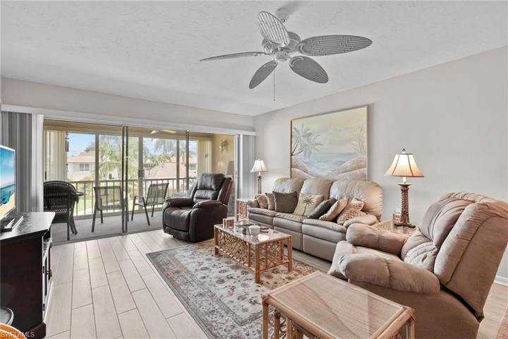 Living area, lanai is air conditioned with two sets of sliders, and can be used as indoor or outdoor space.