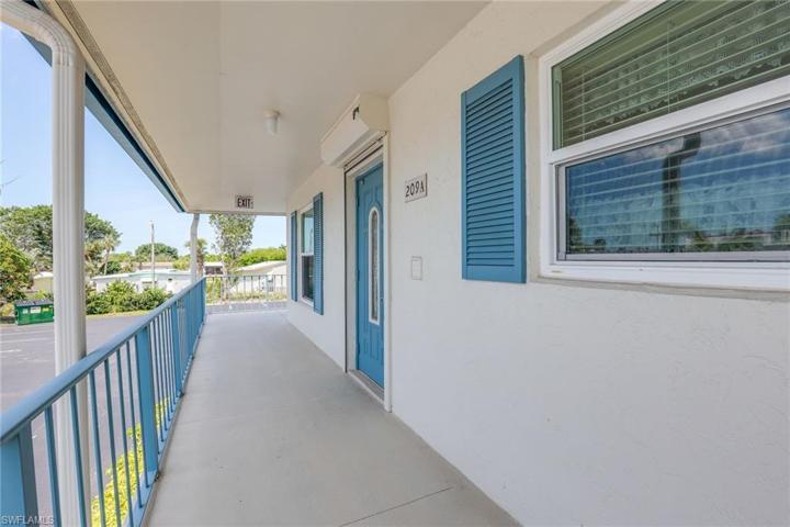 Hurricane roll down shutter protects front entrance. Windows are impact.