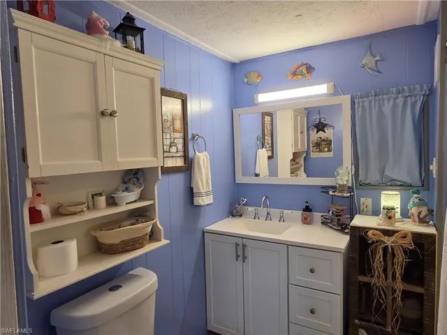 Updated bathroom with lots of storage.