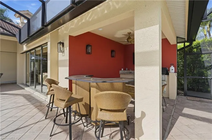 Enjoy family time together in this thoughtfully designed outdoor kitchen.
