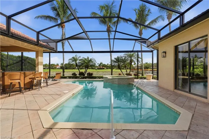 Indoor and outdoor living flow beautifully around the pool.