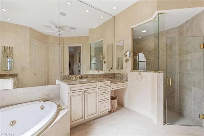 A generous walk-in shower completes the primary bathroom.
