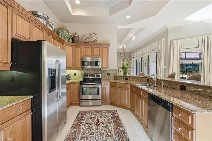 A convenient breakfast bar connects the kitchen and dining area.