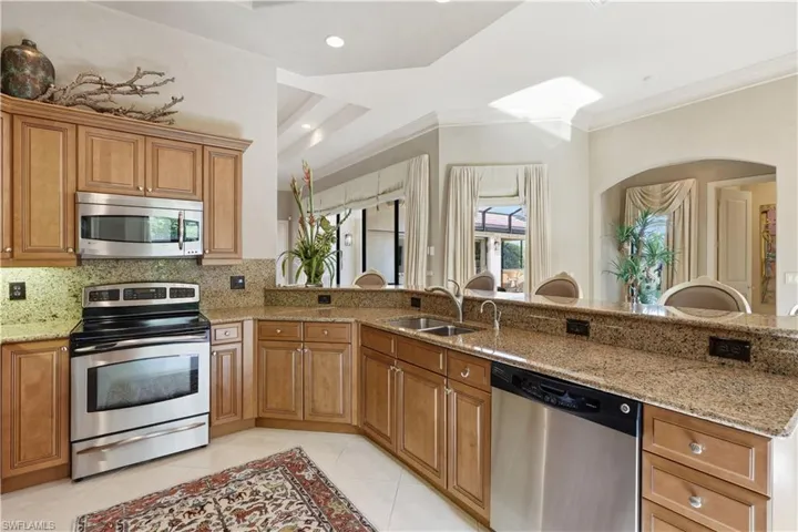 The kitchen is ideally positioned beside the dining room.