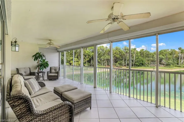 Huge Lanai featuring a wealth of natural light, waterfall & Fountain views, and ceiling fans
