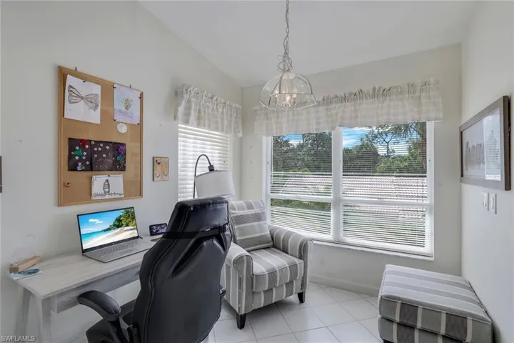 Flex Space - Office or Eating area featuring a wealth of natural light & vaulted ceiling