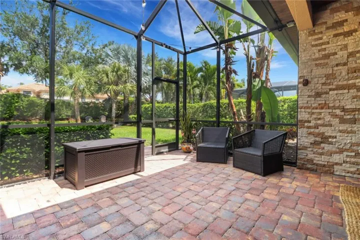 View of patio / terrace with a lanai