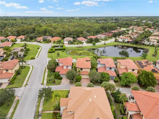 Aerial view of residential area with a large body of water