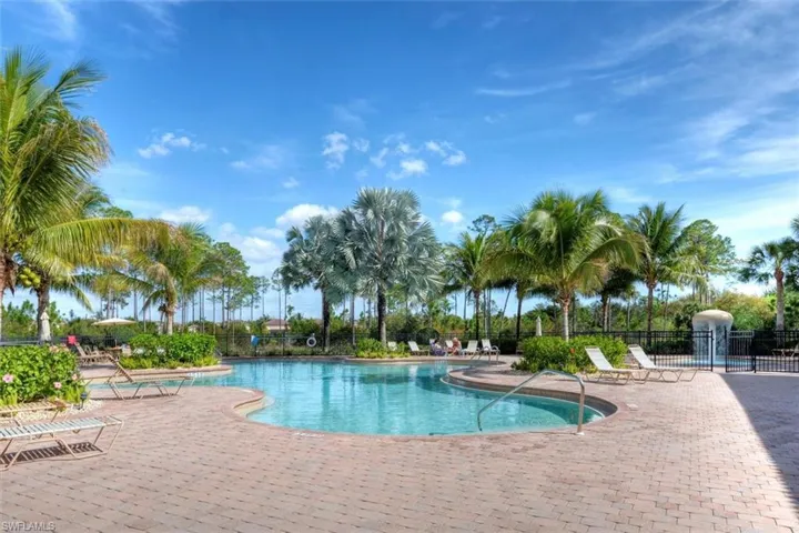 Gracious lagoon pool with marked lanes for lap swimming!