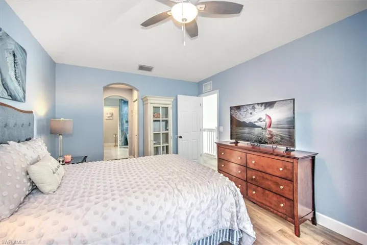 Another view of master bedroom to adjoining luxurious master bathroom!
