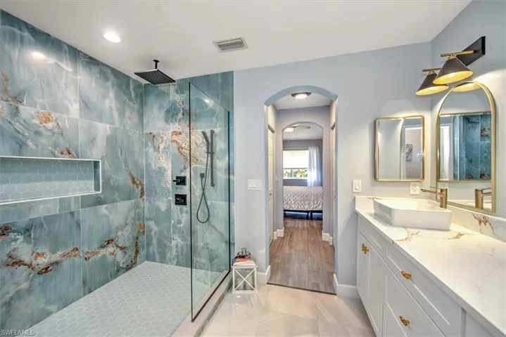 Another view of master bathroom with easy access expansive shower!
