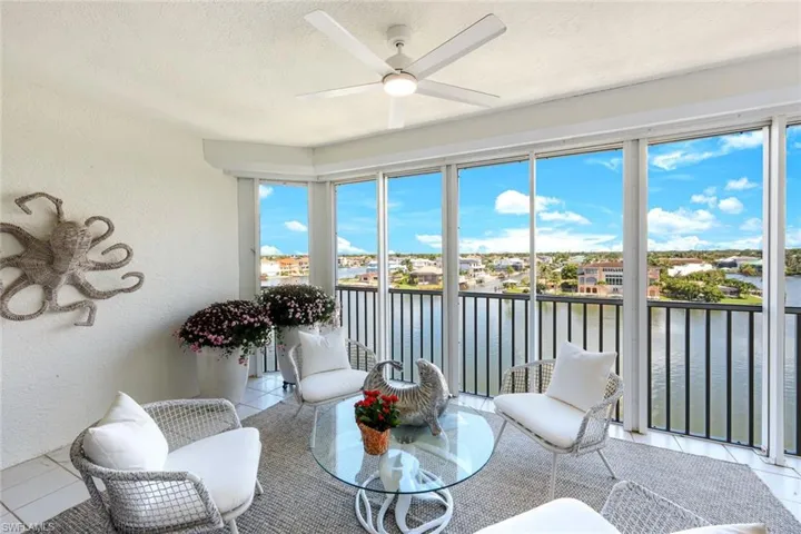 Screened lanai over looking the wide bay! Electric shutters
