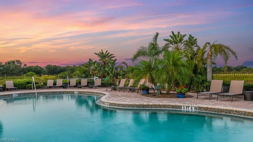 Community pool featuring a patio