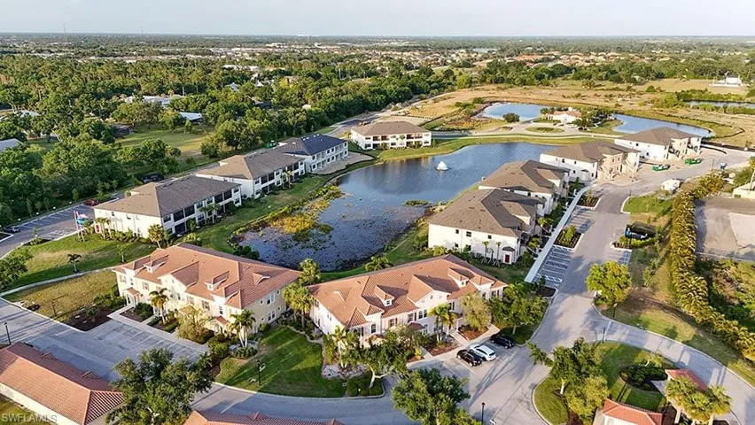 Aerial view of residential area with a nearby body of water
