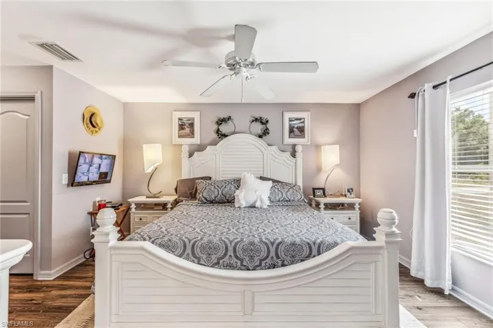 Front Bedroom with Carpet. Ceiling Fan.