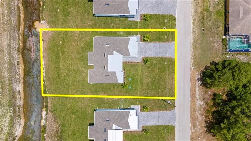 Aerial view of property's location featuring property parcel outlined