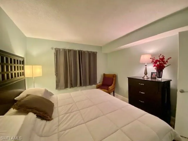 Bedroom featuring a textured ceiling