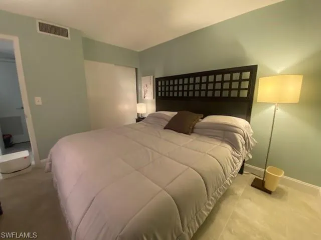 Bedroom featuring baseboards