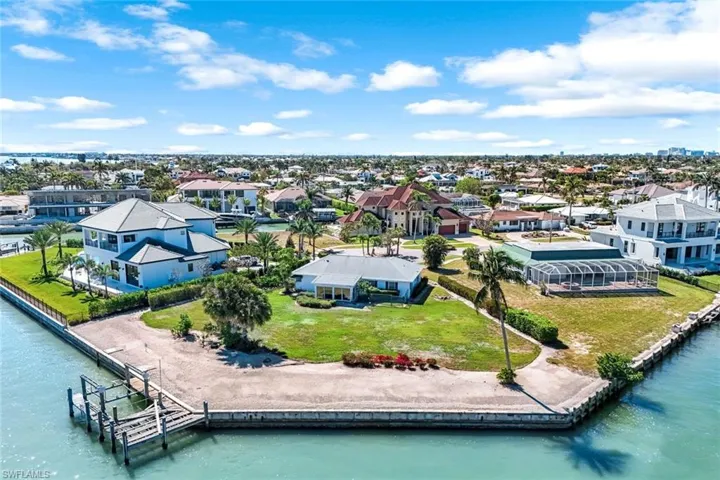 Bird's eye view featuring a water view and a residential view