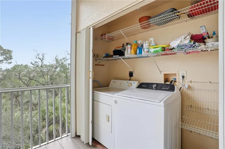 Laundry area featuring independent washer and dryer