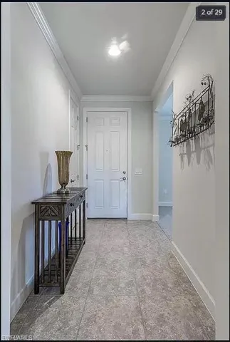 Welcoming foyer with neutral tones and elegant finishes, setting the tone for the home.