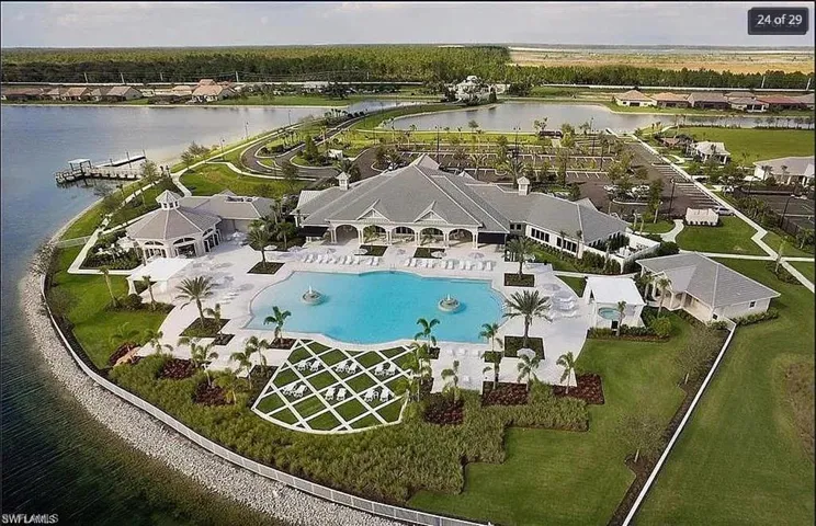 Breathtaking aerial shot showcasing the community’s lush surroundings and amenities.