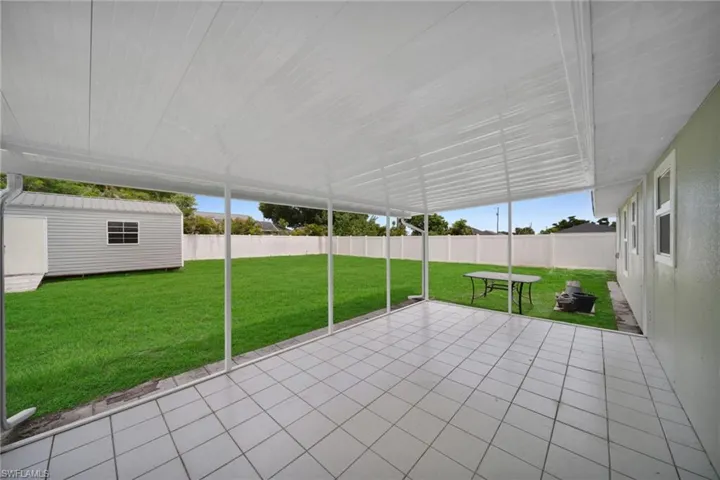 Unfurnished sunroom featuring plenty of natural light