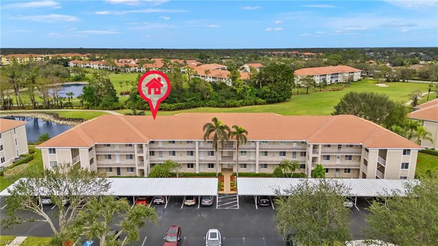 Condo is the first one on the ground level to the left of the walkway.